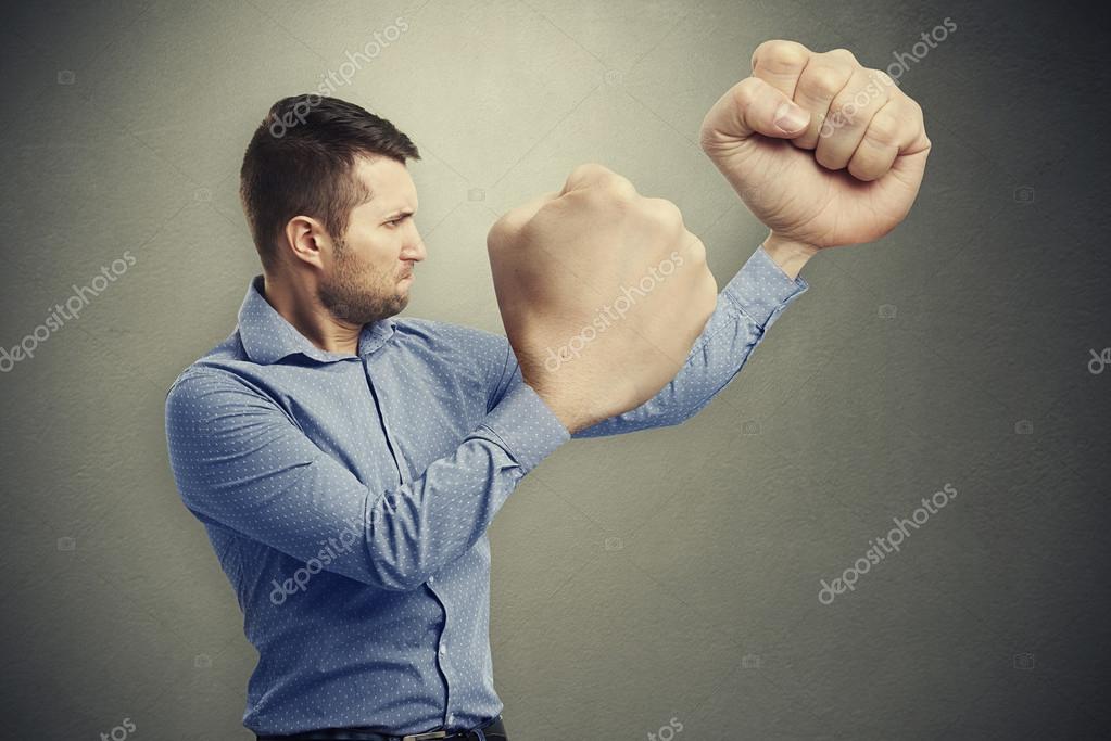 depositphotos_69269283-stock-photo-serious-man-with-big-fists.jpg